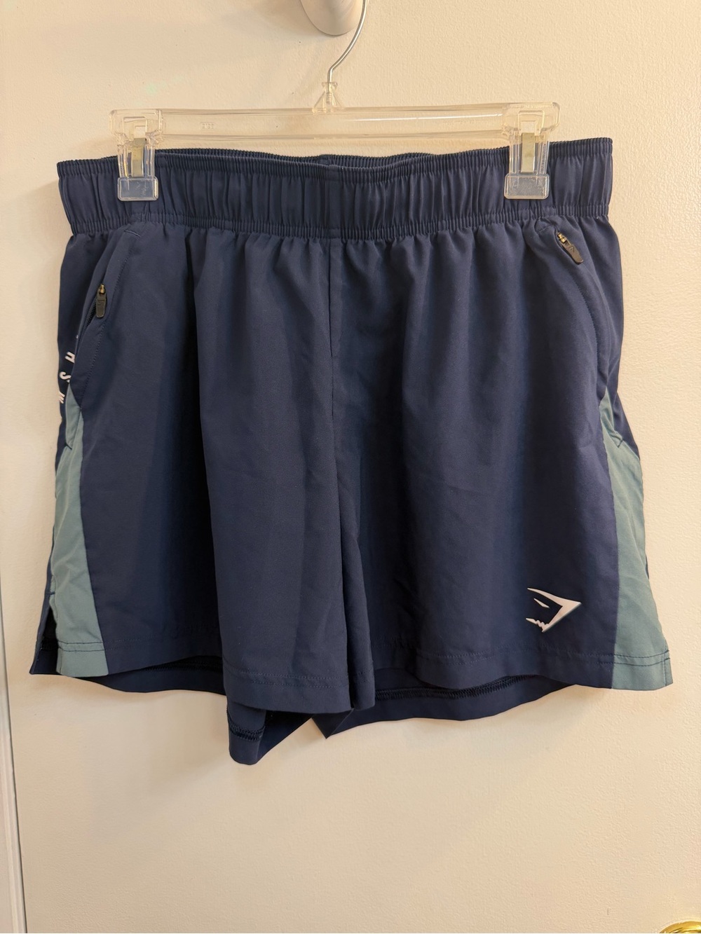 Gymshark Navy Athletic Shorts with Light Blue Side Panels